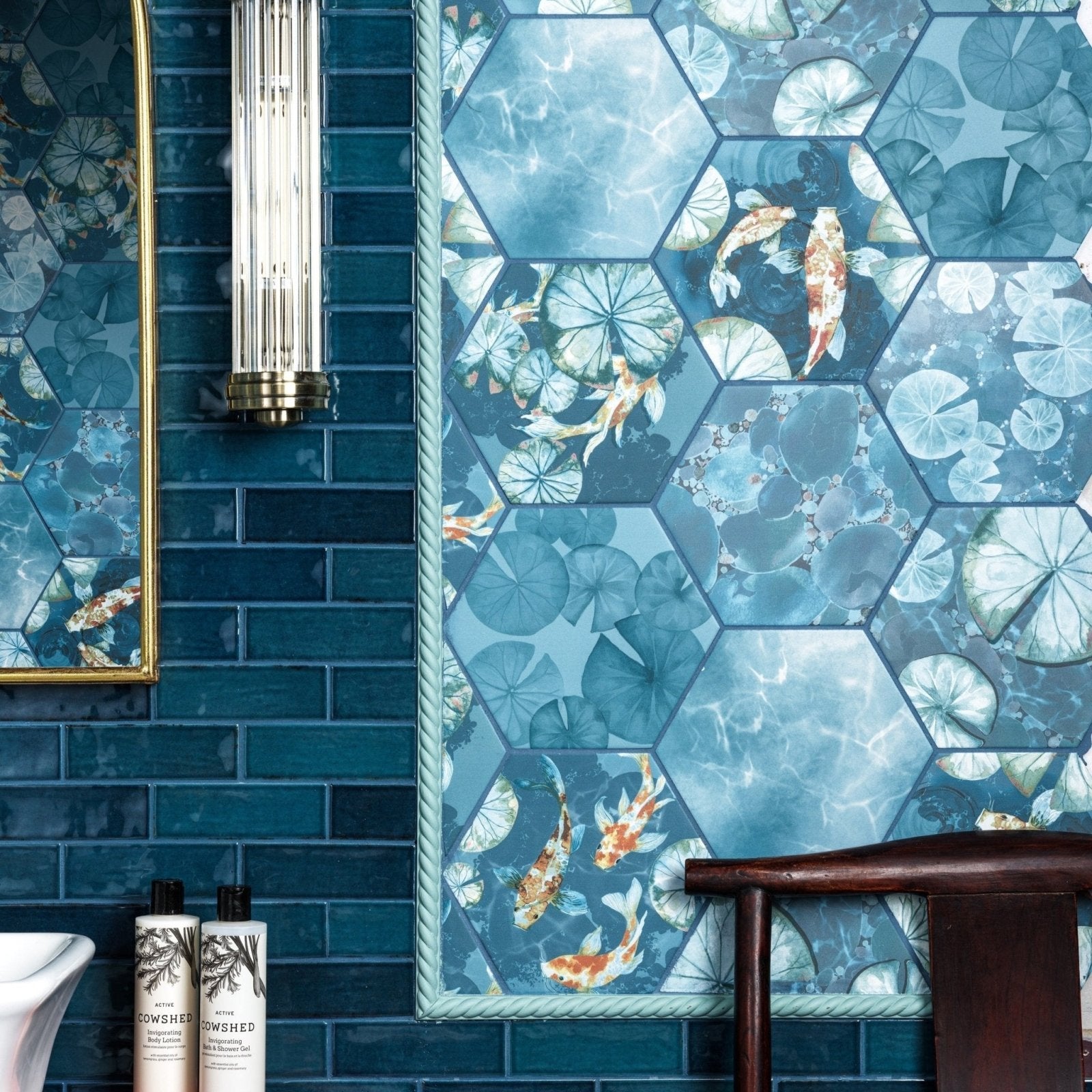 Kiyosumi porcelain hexagonal blue tiles with watercolor koi fish and lotus leaves framed by rope border