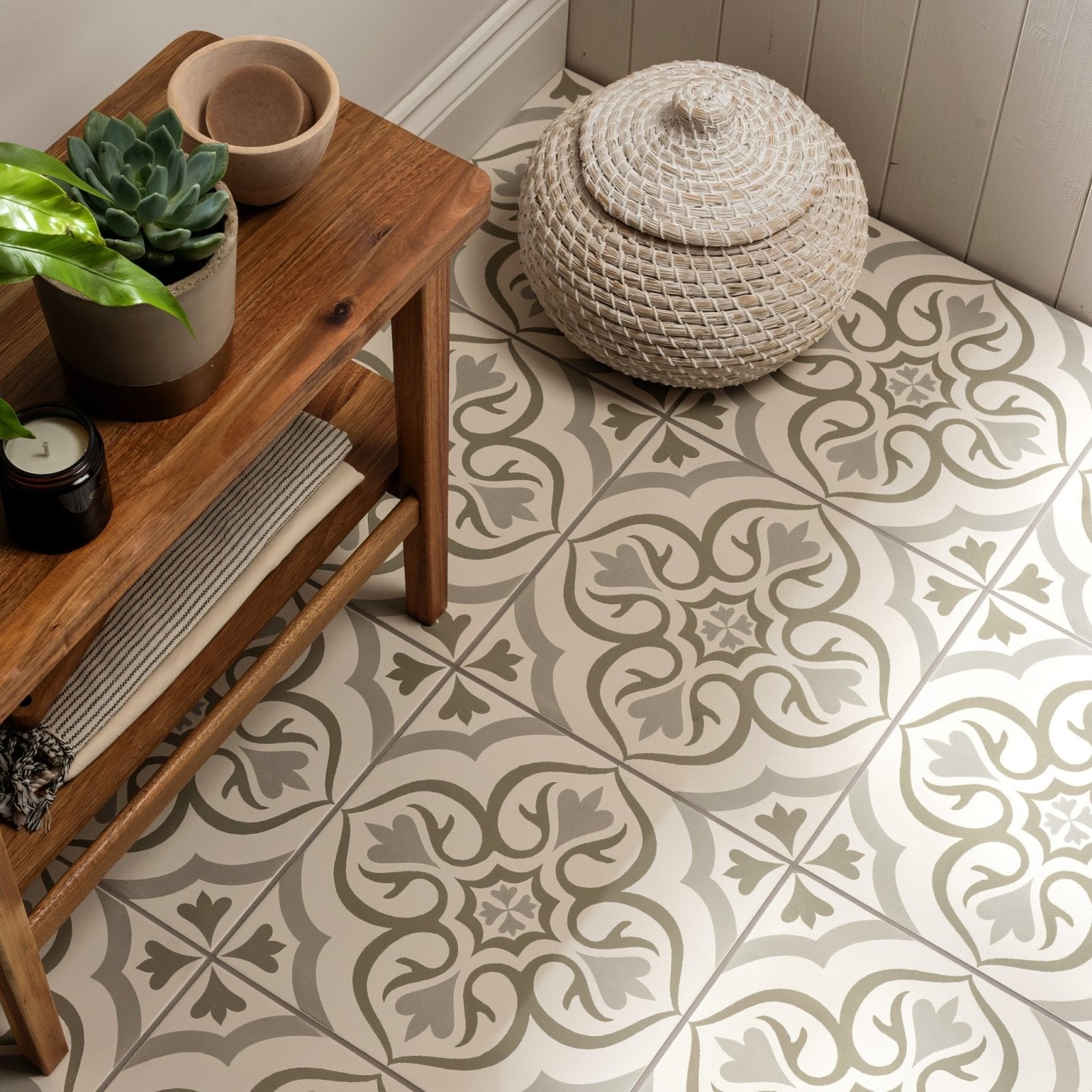 Beige woven basket with matching lid and intricate braided pattern from the Knightshayes Green on Chalk collection