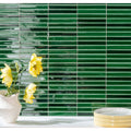 Vibrant emerald green glossy rectangular glass mosaic tile wall from koeda jungle crackle collection