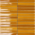 Golden glossy rectangular ceramic tiles arranged in a horizontal mosaic pattern from koeda mustard crackle collection
