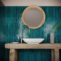 Koeda XL Sapphire Crackle teal glass mosaic with a white vessel sink on a wooden countertop