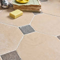 Beige and gray hexagonal lacock limestone tiles with heritage finish and rustic textured octagon and cabochons design