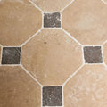 Beige and black octagonal lacock limestone heritage finish stone tiles with white grout forming a geometric pattern
