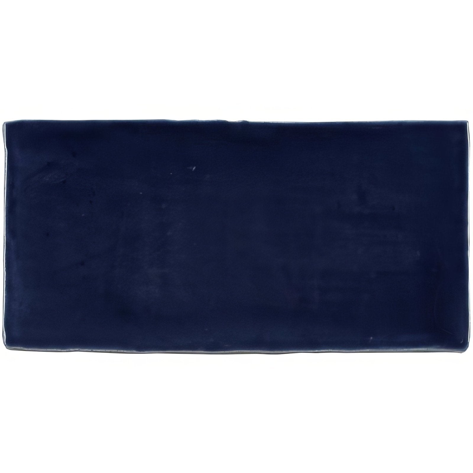 Lapis brick tile navy blue rectangular ceramic tile with smooth slightly glossy finish and subtly rounded edges