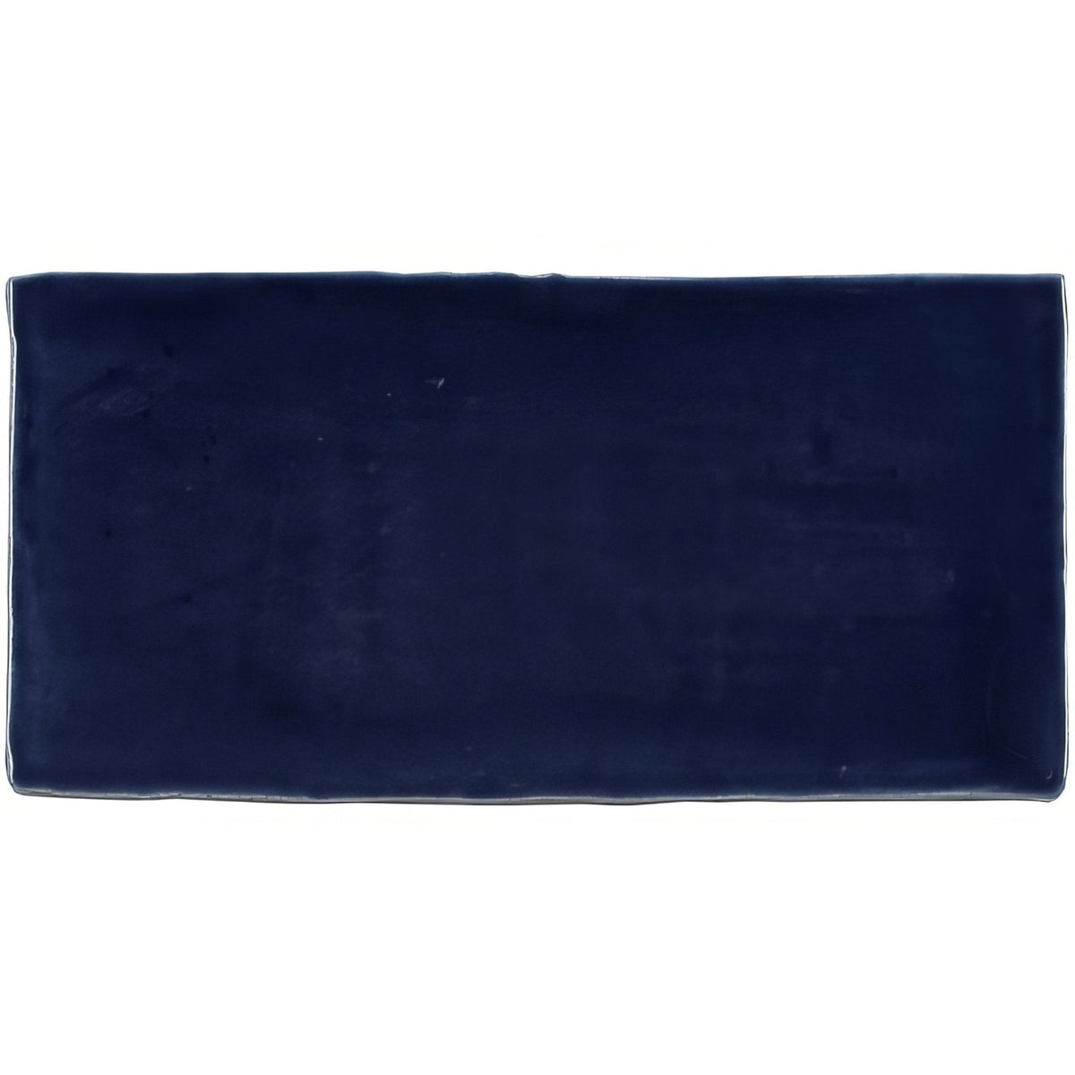 Lapis brick tile navy blue rectangular ceramic tile with smooth slightly glossy finish and subtly rounded edges