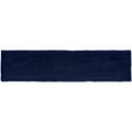 A rectangular navy blue ceramic lapis large brick tile with a smooth glossy finish
