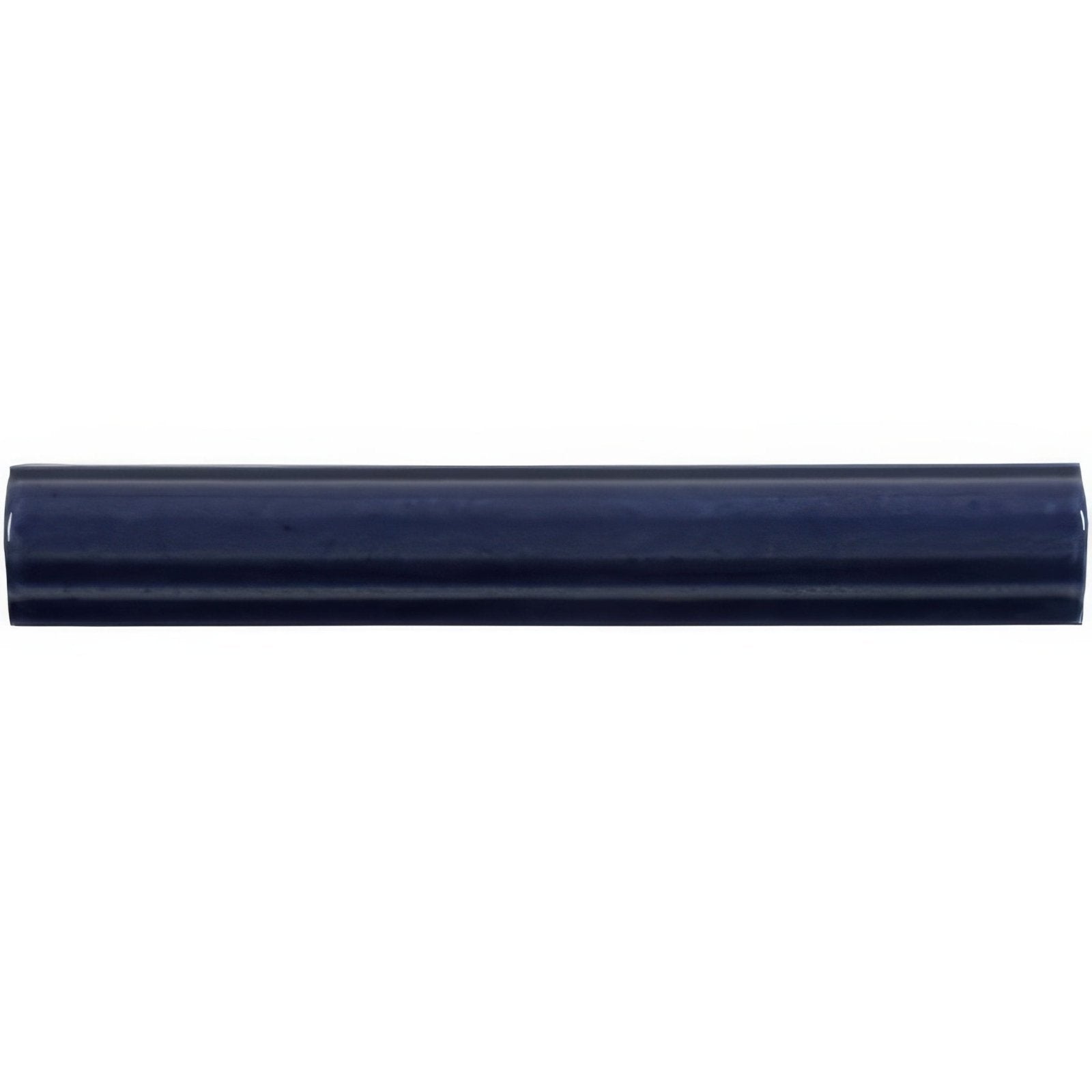Deep navy blue ceramic lapis ogee moulding tile with glossy finish and subtle horizontal ridges for decorative use
