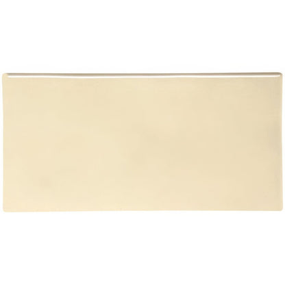 Cream-colored rectangular ceramic Lavenham half tile with a smooth glossy finish for wall and floor use