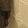 Cream-colored ceramic tile lavenham hampstead with embossed floral design for decorative wall use