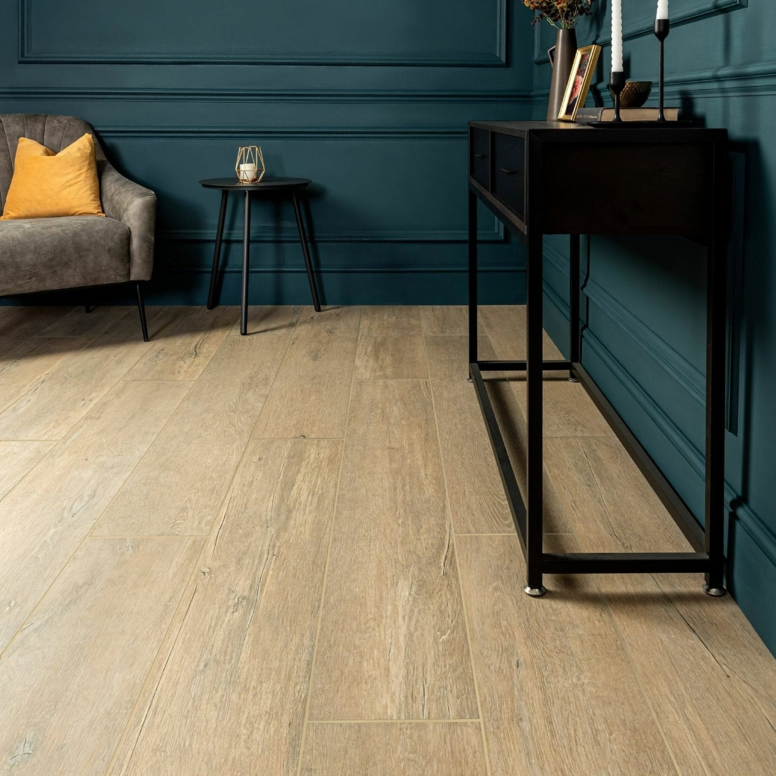 Lenke taupe wood effect tiles featuring light oak-colored wood-look laminate flooring with natural grain pattern