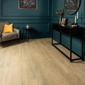 Lenke taupe wood effect tiles featuring light brown wood-look laminate flooring with natural grain and subtle texture