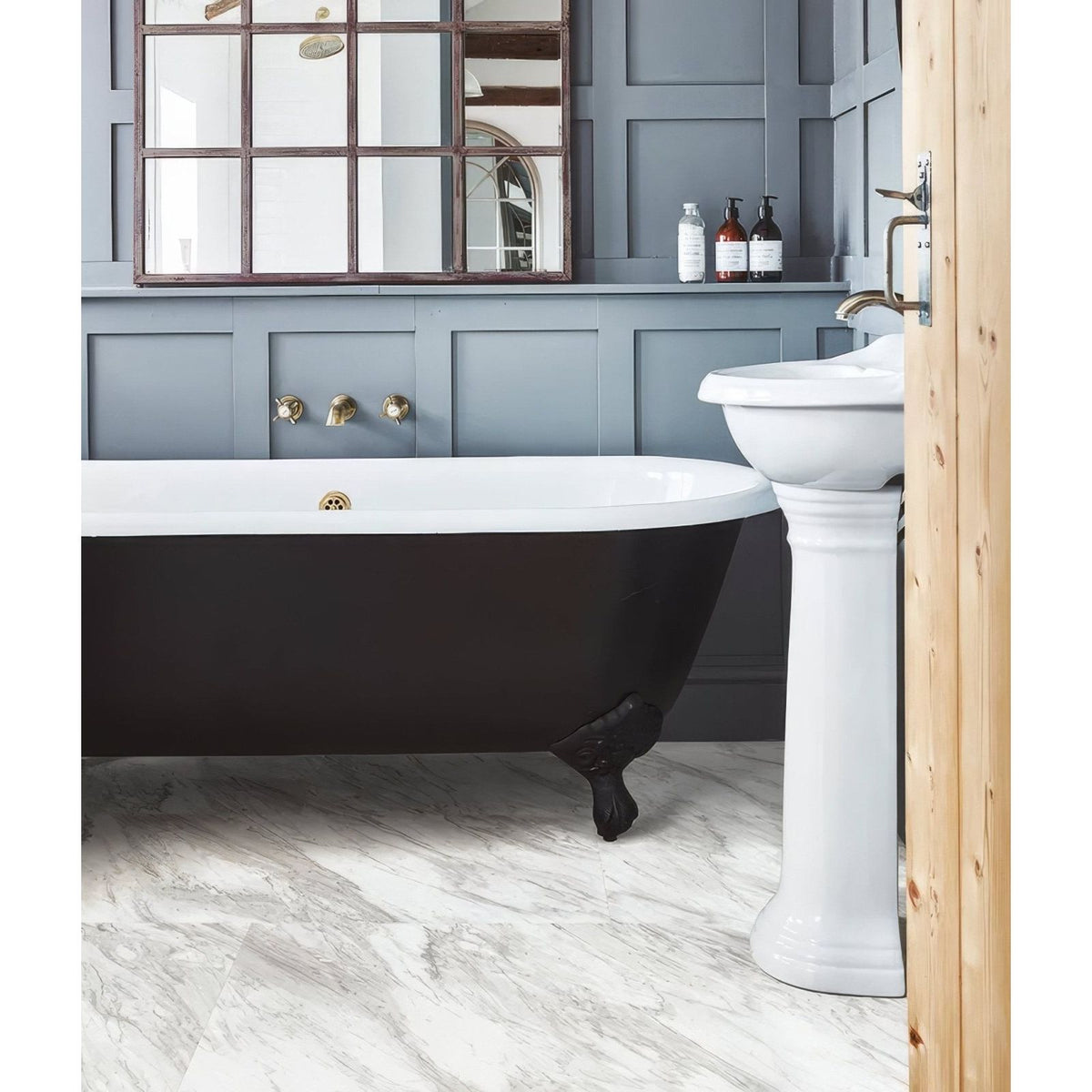 Leonardo Minerale Pure Matt Click Tile white marble-effect tiles with a black clawfoot bathtub