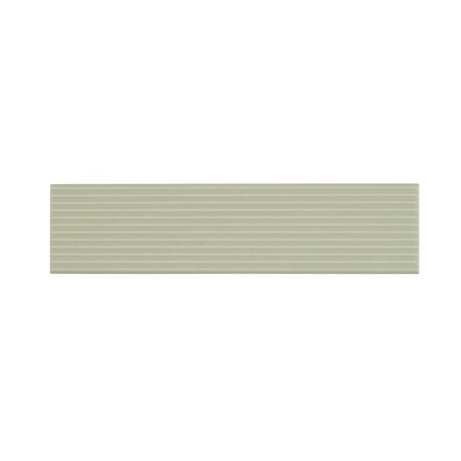 A rectangular matte-finished ceramic tile in soft sage green with subtle horizontal ridges levante ridge sage