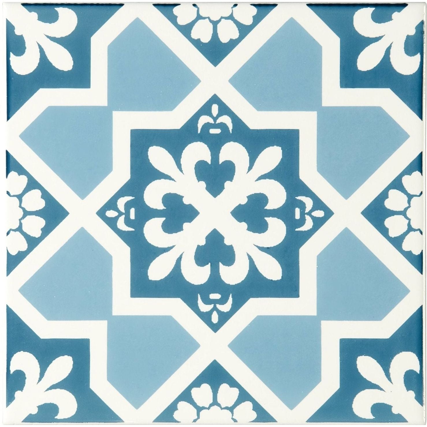 Liberté blue on brilliant white ceramic tile with intricate blue and white floral and geometric patterns