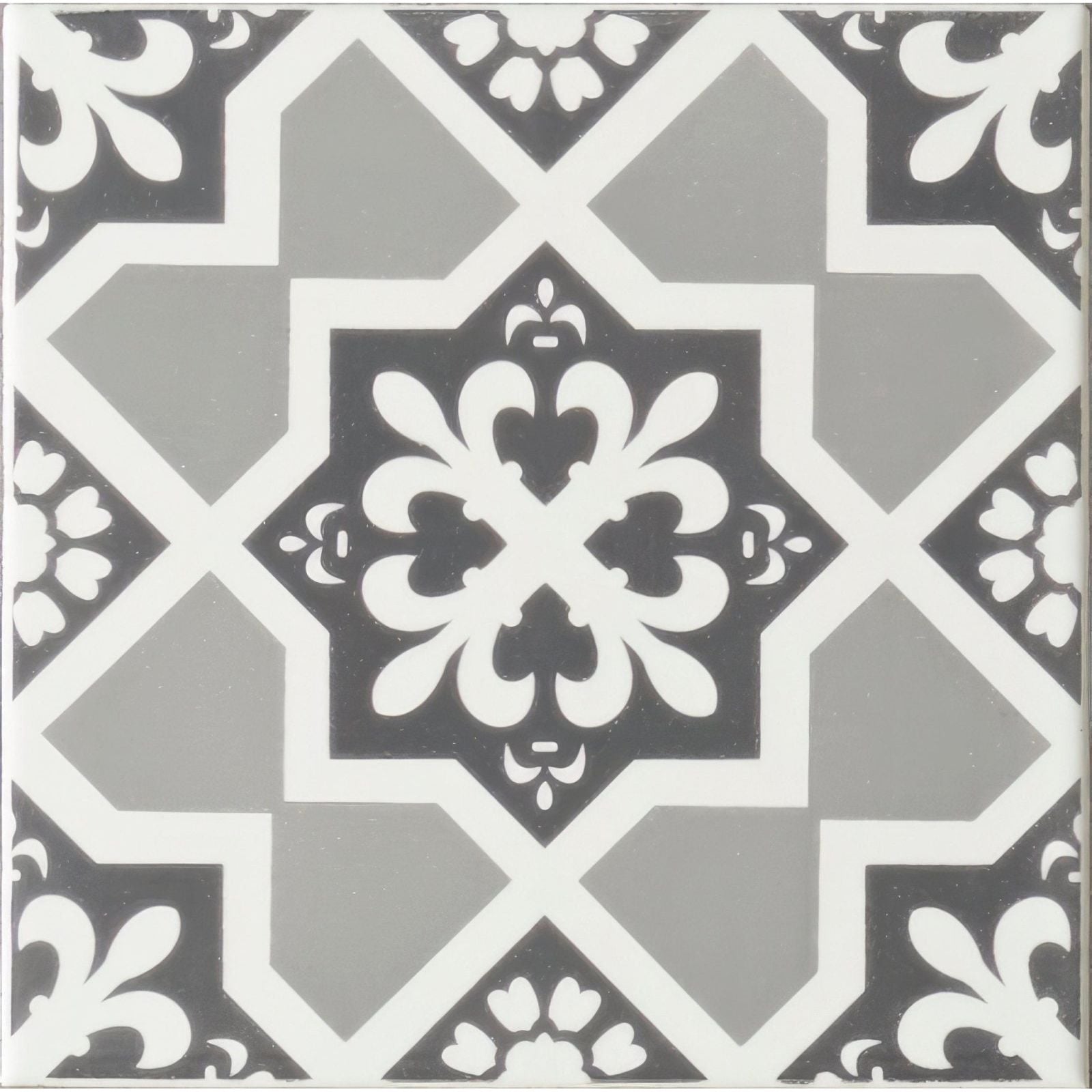 Black and white ornate patterned tile liberté grey on brilliant white with central floral motif for wall or floor use