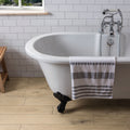 Lignum Cream Natural Rectified Glazed Porcelain cream wood-effect porcelain tiles with a clawfoot bathtub
