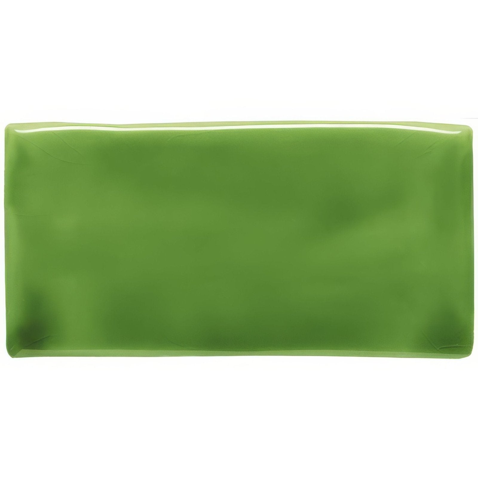 A glossy rectangular lime green ceramic half tile with smooth edges and a uniform matte finish