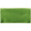 A glossy rectangular lime green ceramic half tile with smooth edges and a uniform matte finish