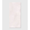 A sleek minimalist white rectangular lin porcelain tile with a smooth slightly glossy finish 60 x 120cm