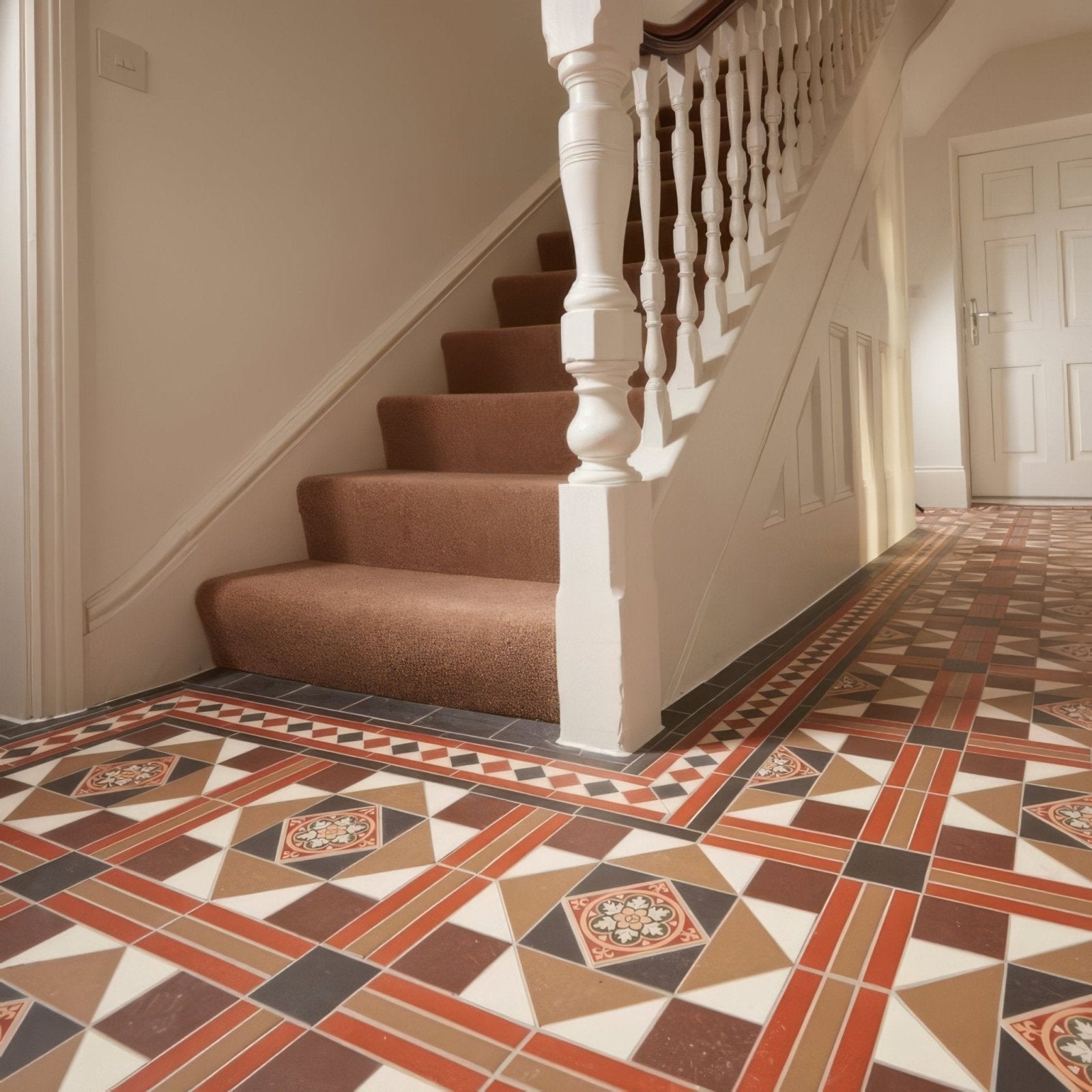 Intricate geometric mosaic floor tiles lindisfarne black brown red regency bath white with livingstone green on buff