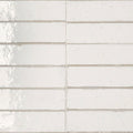 White ceramic subway tiles lisbon warm white shine with a subtle matte finish and faint speckles