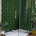 Green glossy ceramic subway tiles with white grout liso verde gloss 100x200 for wall applications