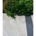 Light gray marble-effect lithos porcelain paving tiles with subtle veining and textured blanc finish