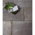 Gray stone-effect lithos porcelain paving tiles with matte finish and subtle texture for outdoor flooring