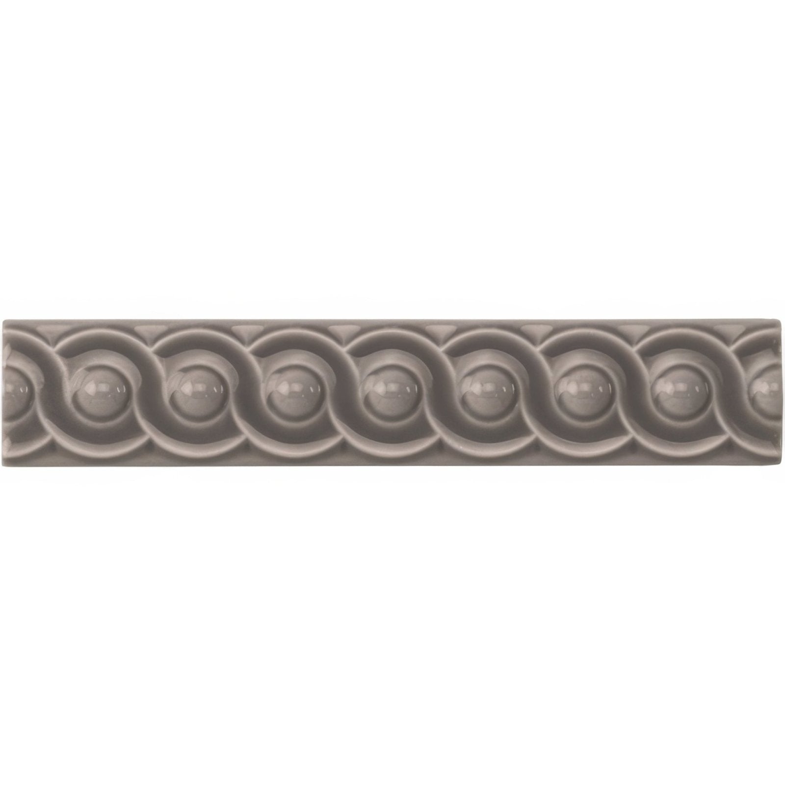 Gray ceramic tile london stone scroll moulding with raised rounded bead-like repeating pattern for decorative use
