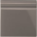 London Stone skirting tile matte gray ceramic with subtle glossy finish and raised horizontal ridges on top edge