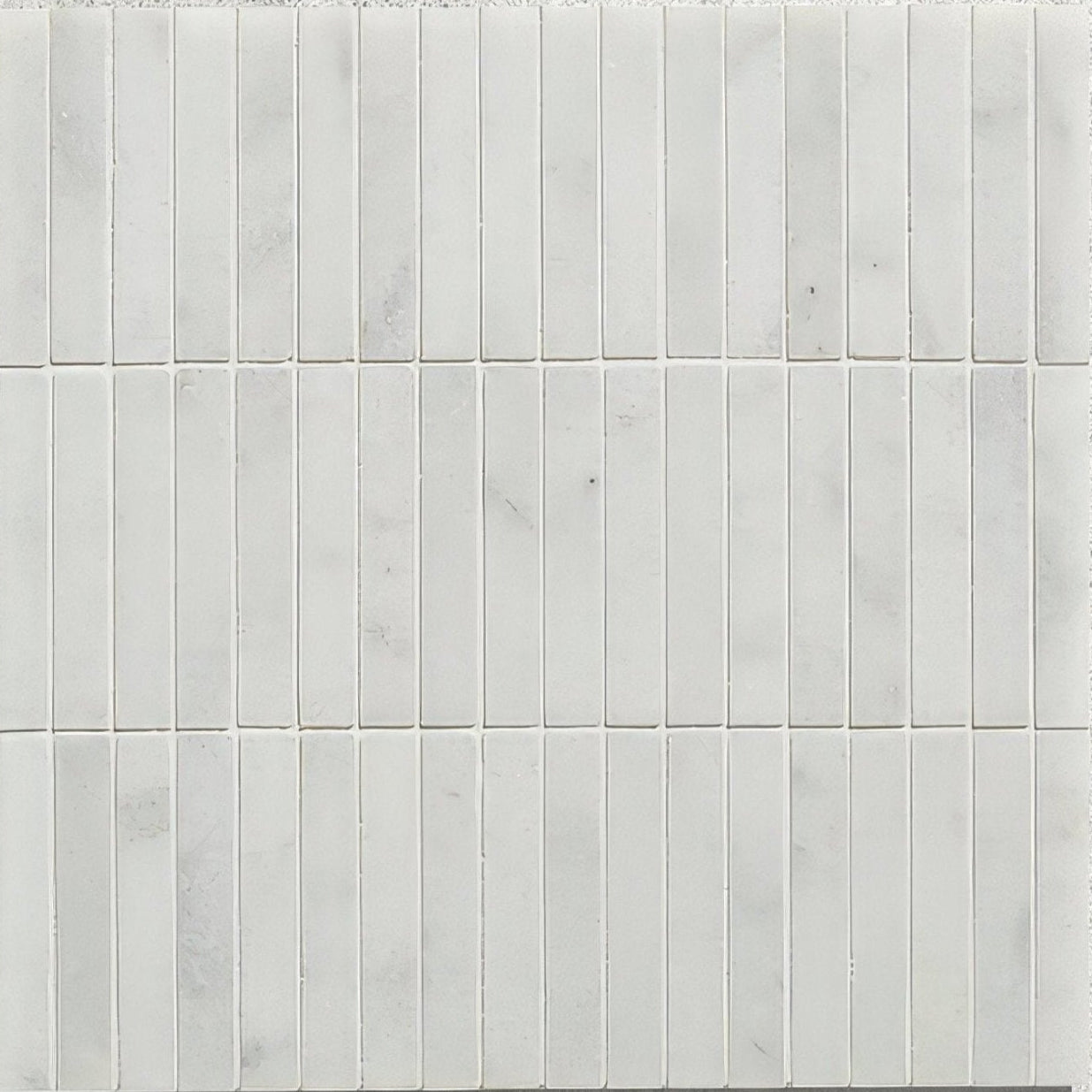 Long island marble bamboo mosaic featuring white marble subway tile with subtle gray veining in a mosaic pattern
