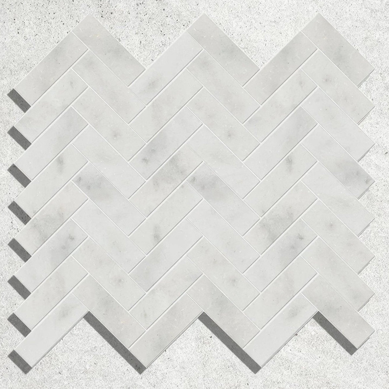Long island marble herringbone mosaic featuring white marble tiles arranged in a herringbone pattern