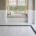 Long Island Marble Honed Finish white marble tiles with an upholstered window seat