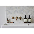 Long Island Marble Scallop Mosaic grey marble scallop mosaic with a white sink and brass taps