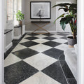 Long island marble tumbled finish black and white marble tiles arranged in a diamond pattern 40.6 x 40.6 cm