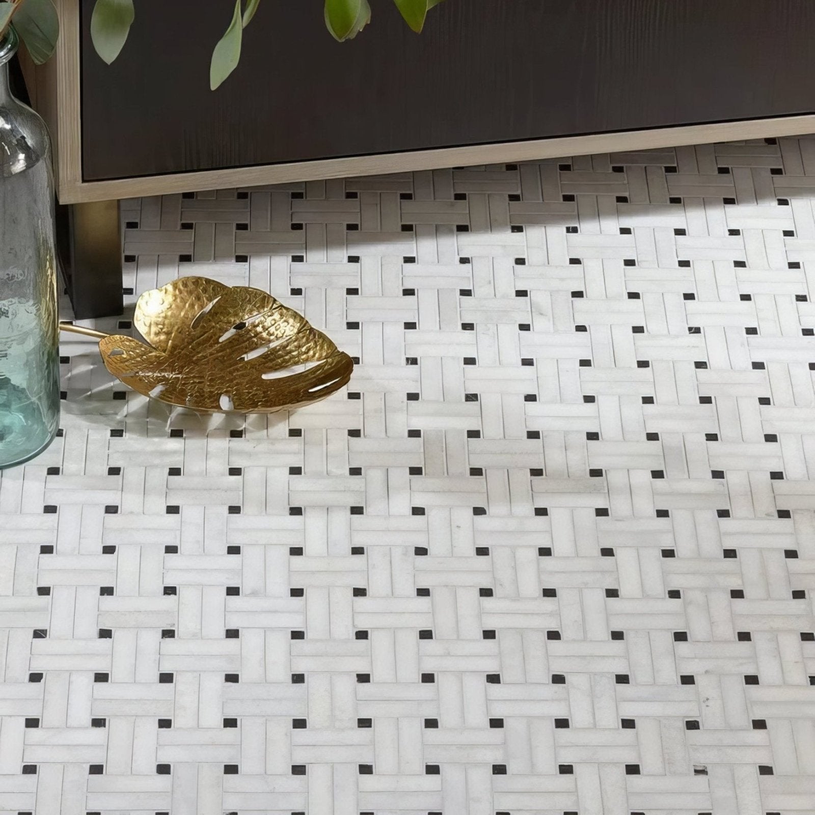 Long Island Marble Wicker Mosaic white and black woven marble mosaic floor with a gold leaf-shaped tray