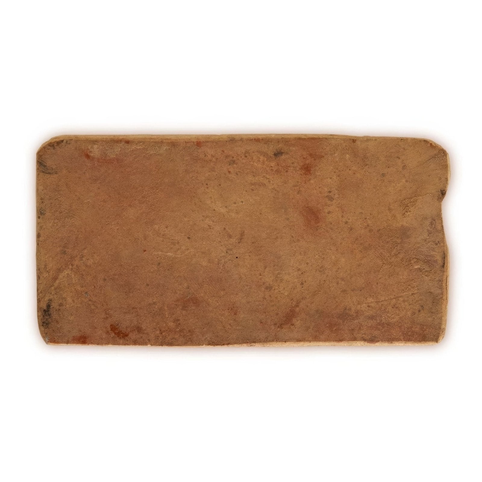 A rustic earth-toned rectangular terracotta lubelska brick with textured surface and slightly uneven edges