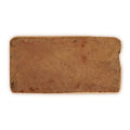 A rustic earth-toned rectangular terracotta lubelska brick with textured surface and slightly uneven edges