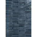 Dark blue rectangular ceramic tiles with a glossy slightly uneven surface from luminous lume blu china collection