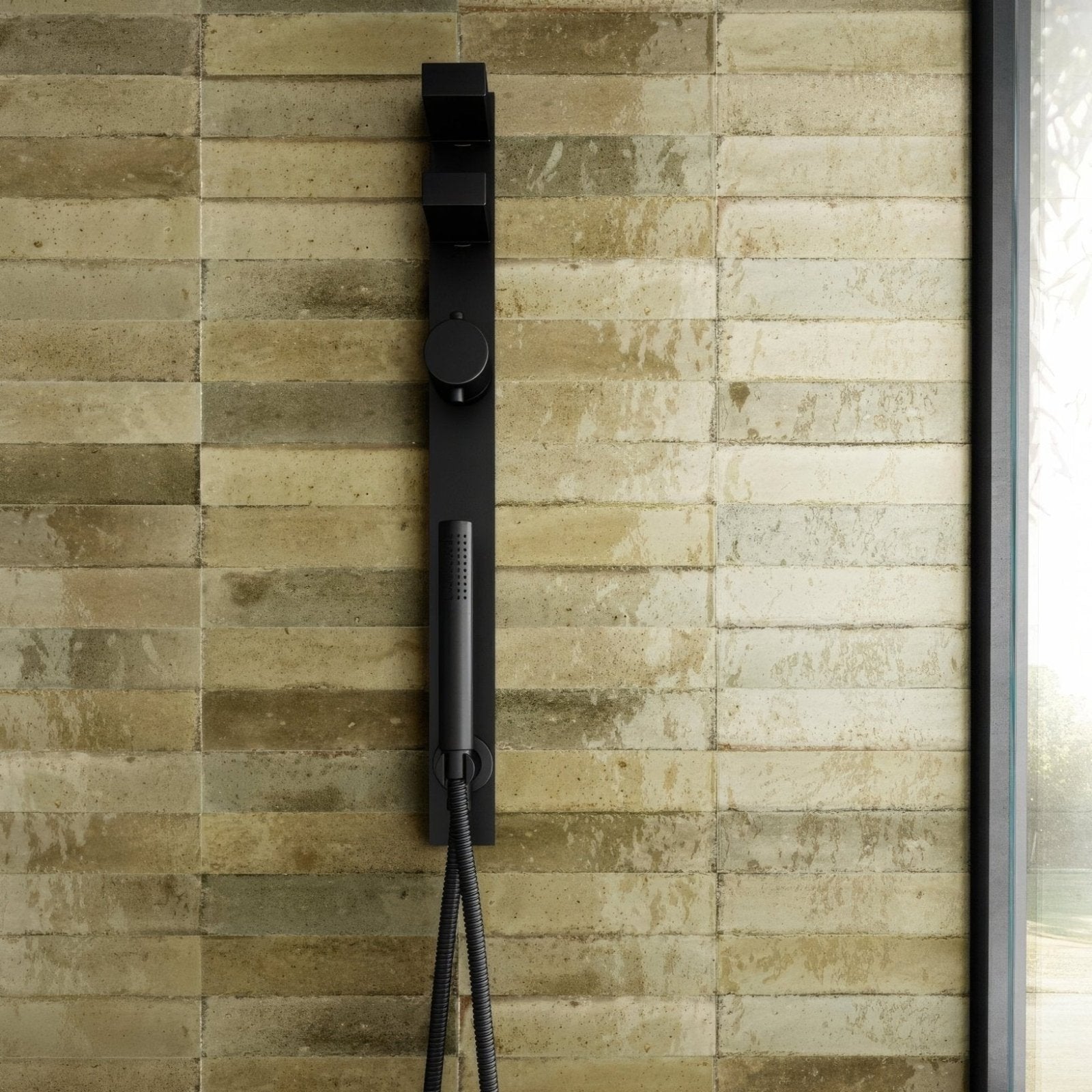 Luminous Lume Musk black matte-finish modern shower system with sleek vertical design and integrated handheld nozzle