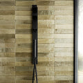 Luminous Lume Musk black matte-finish modern shower system with sleek vertical design and integrated handheld nozzle