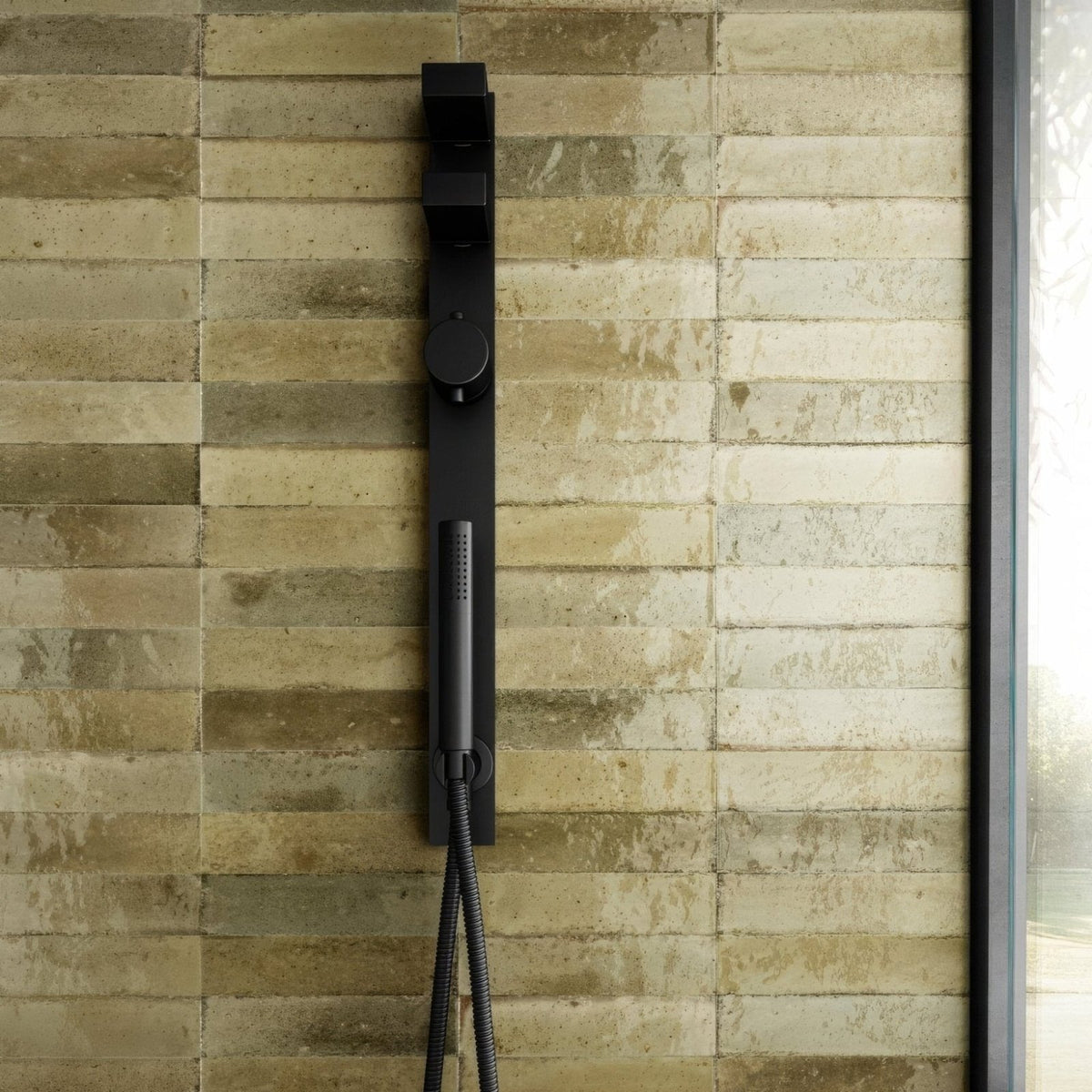 Luminous Lume Musk black matte-finish modern shower system with sleek vertical design and integrated handheld nozzle