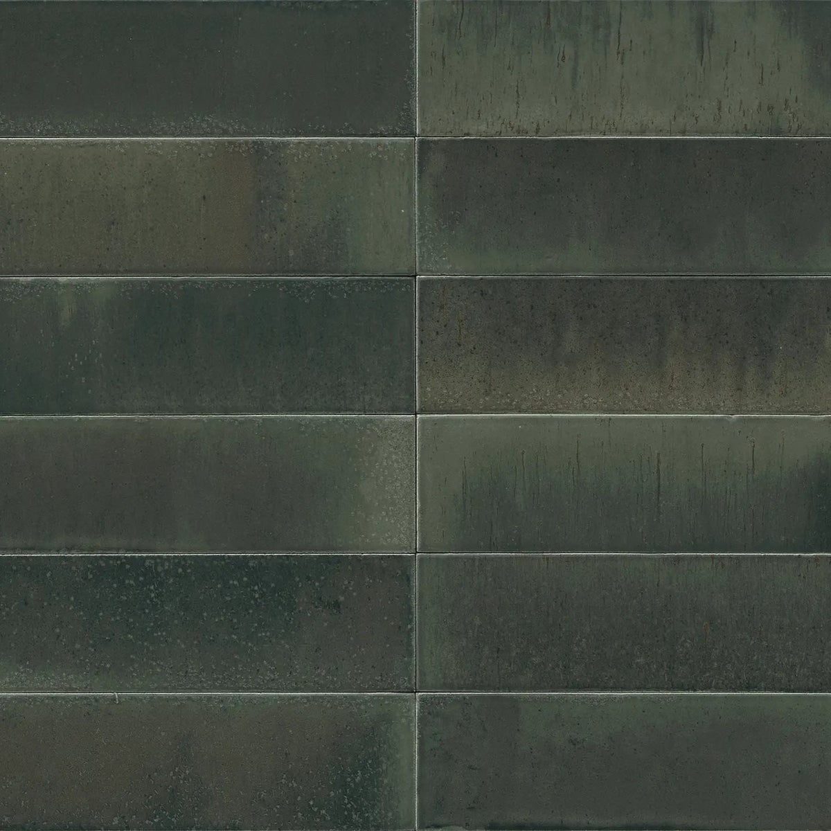 Dark green rectangular tiles with subtle textured finish from luminous lume verde forest collection