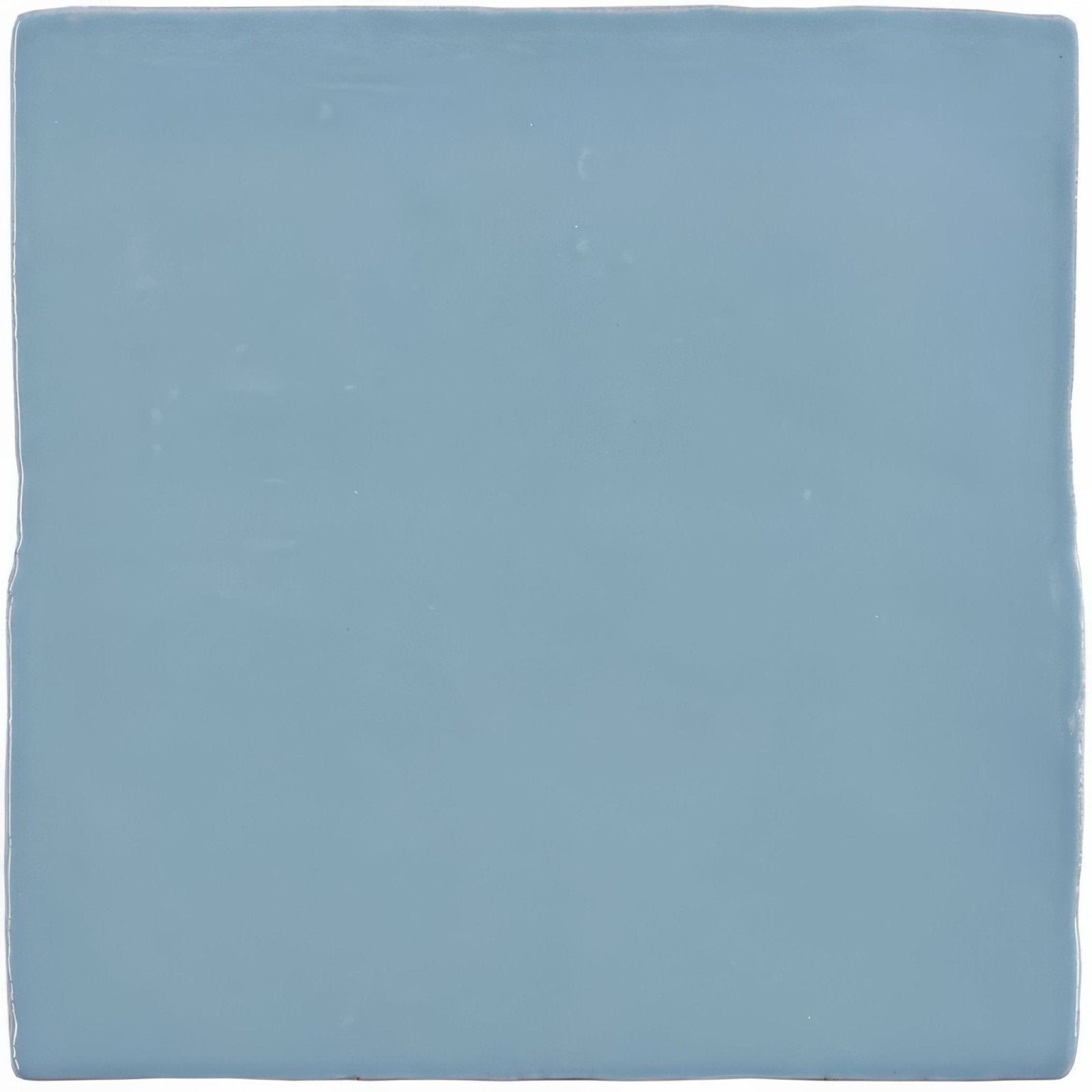A square matte-finished ceramic lupin field tile in soft sky blue perfect for walls and floors
