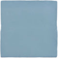 A square matte-finished ceramic lupin field tile in soft sky blue perfect for walls and floors