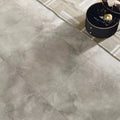 Gray marble-effect Lux White 60 x 60cm floor tiles with subtle veining and a glossy finish