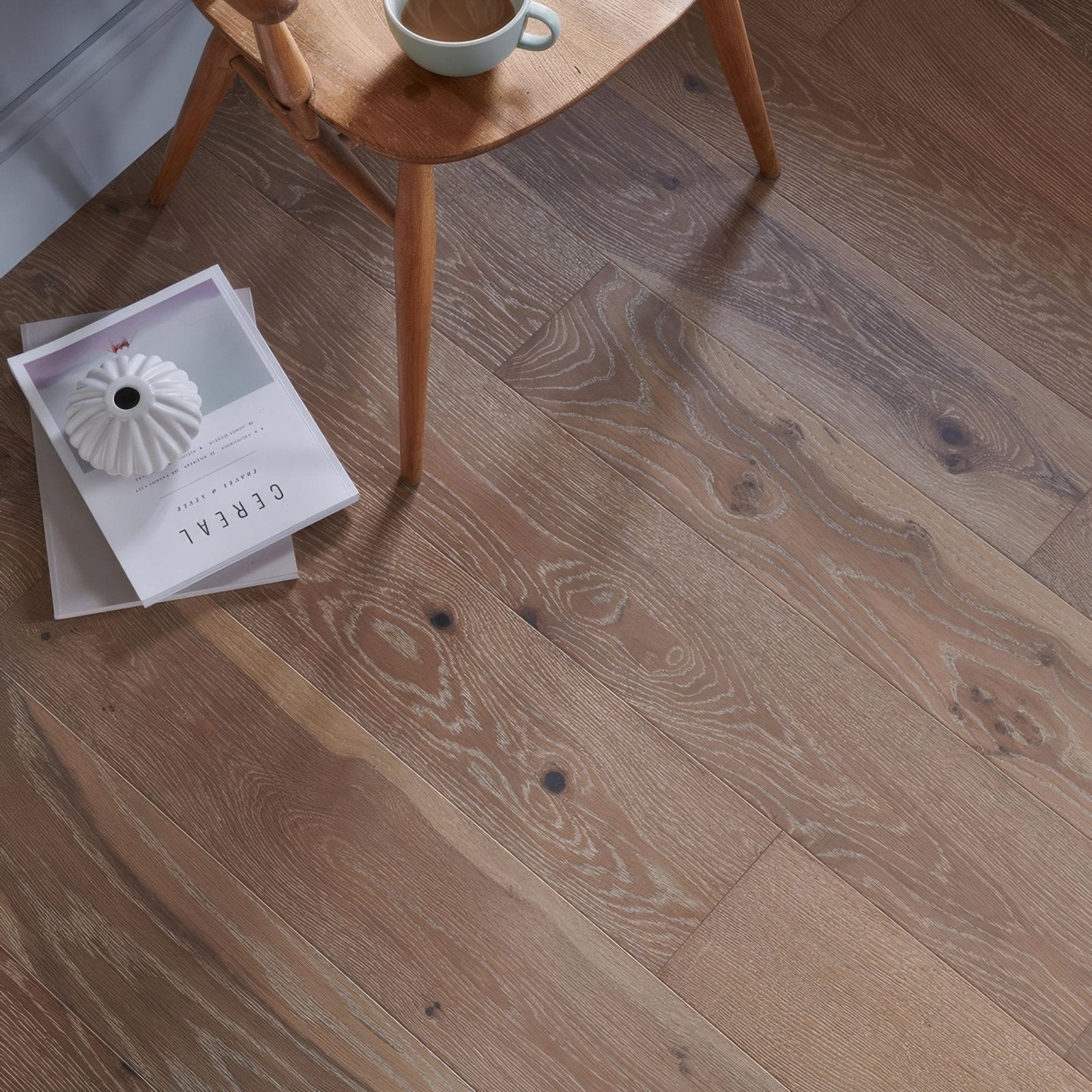 Lynton estuary oak warm-toned oak hardwood flooring with natural wood grain and subtle knots