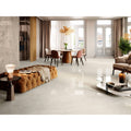 Shiny white marble-effect floor tiles lyon 1837 crema polished with subtle veining pattern