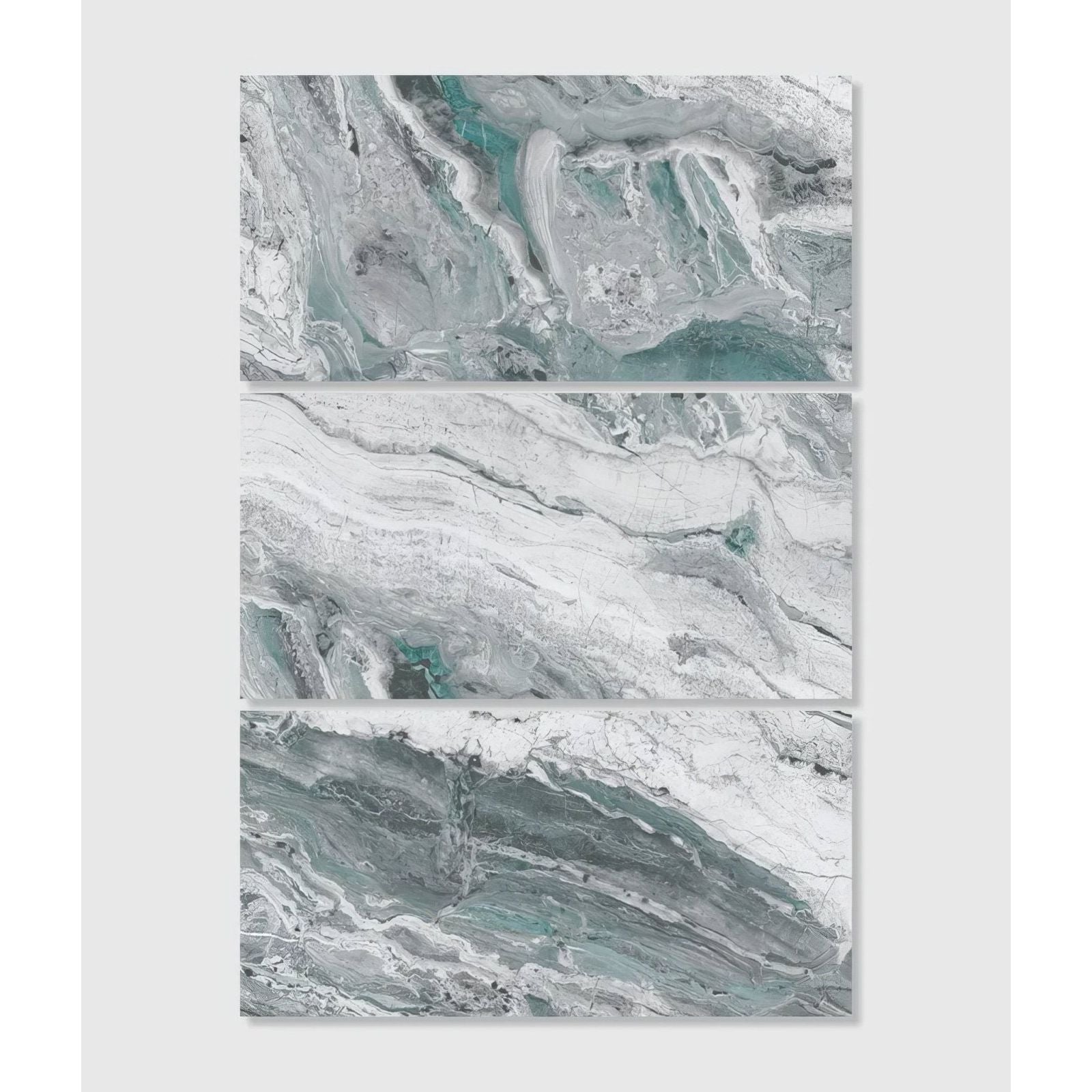 Magnifique Porcelain Ocean three-panel bookmatched marble-effect porcelain in white, grey and teal