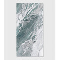 Magnifique Porcelain Ocean Bookmatched marble-effect porcelain panel with a teal, grey and white pattern